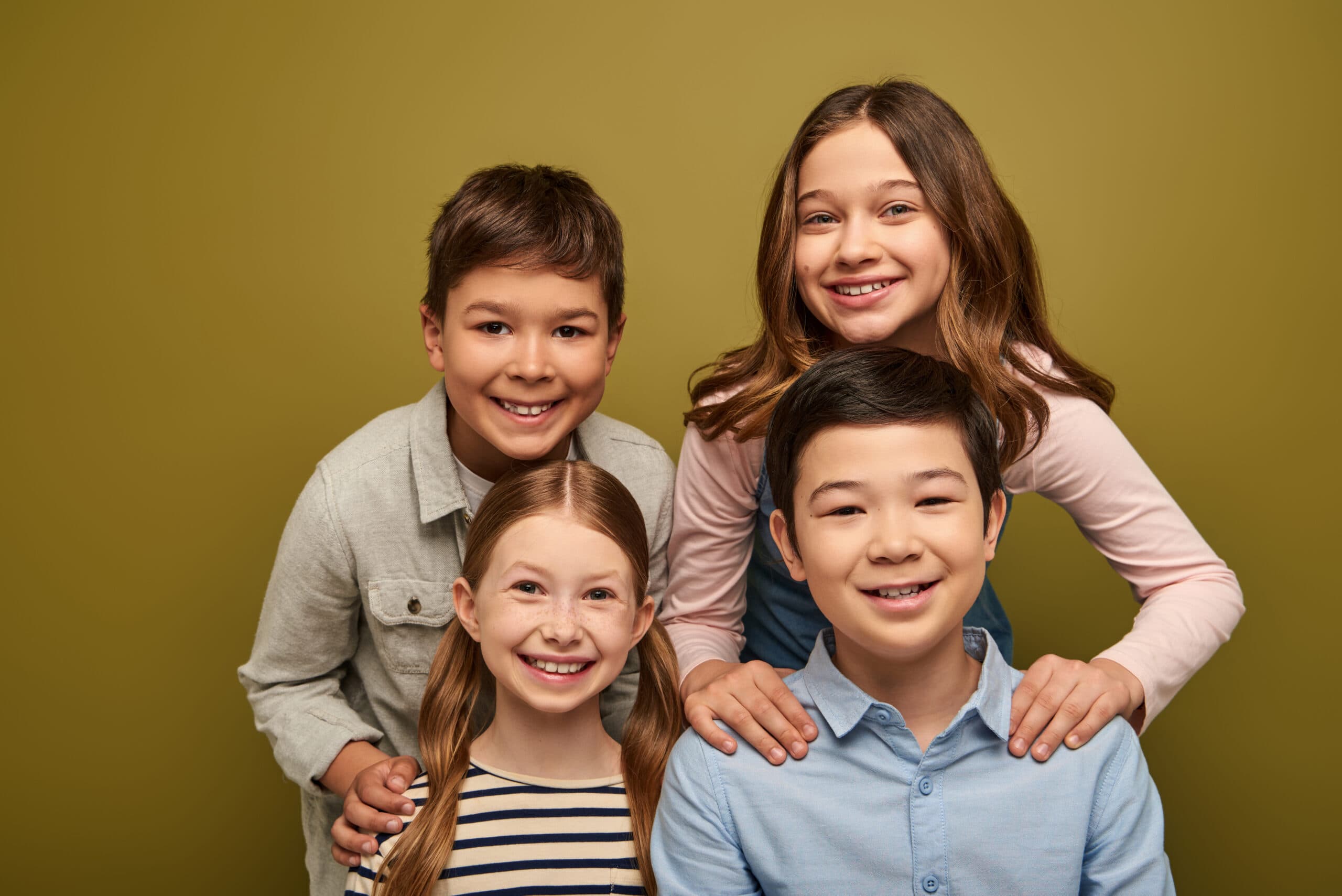 Group of siblings smiling - sibling DNA testing